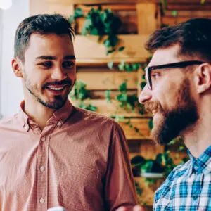 a partner closing a deal with a potential customer on equipment financing