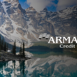 Mountain landscape with Armada Credit Group logo